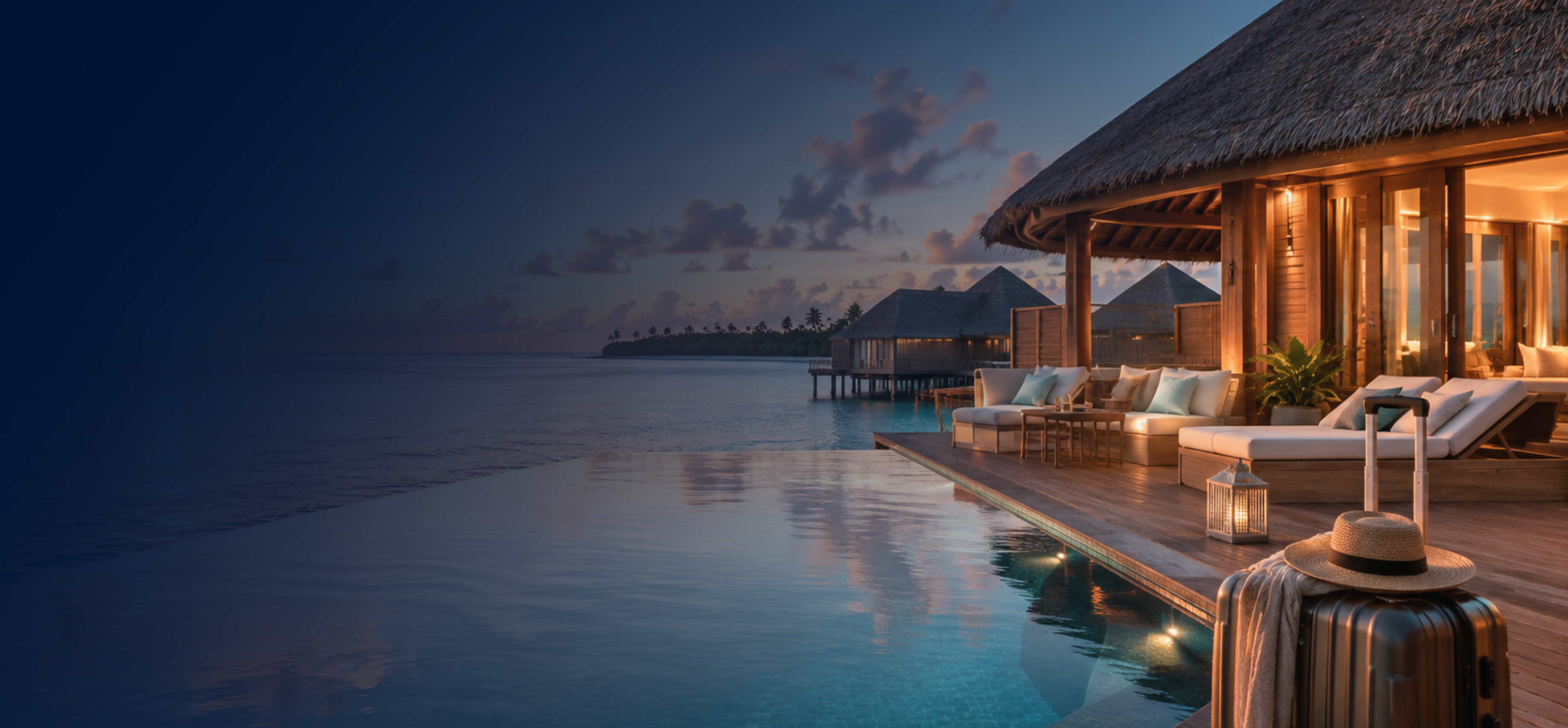 Overwater villa with infinity pool at dusk